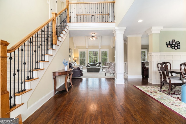 7497 Treehouse Ct, Douglasville, GA 30135 - foyer with baseboards, ornamental molding, wood finished floors, and a high ceiling