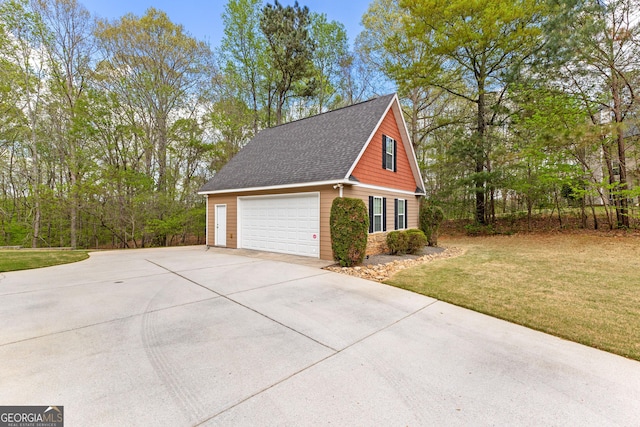 garage featuring driveway