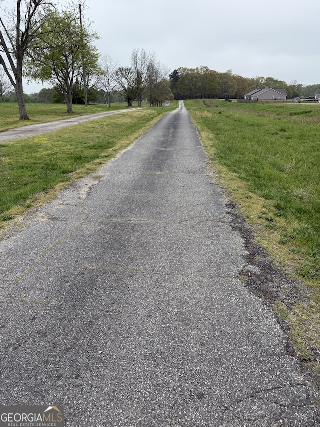 view of street featuring a rural view