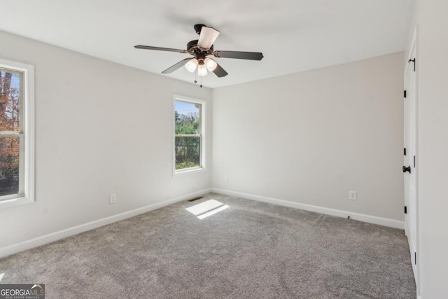3143 Lee Cir, Buford, GA 30518 - spare room with carpet floors, baseboards, visible vents, and ceiling fan