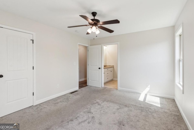 3143 Lee Cir, Buford, GA 30518 - unfurnished bedroom with baseboards, multiple windows, and light colored carpet