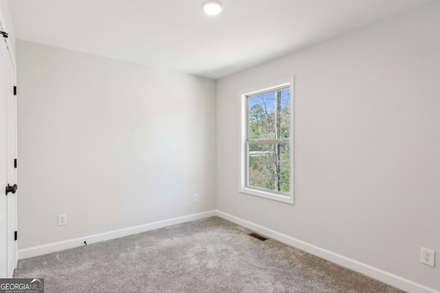 3143 Lee Cir, Buford, GA 30518 - carpeted spare room with baseboards and visible vents