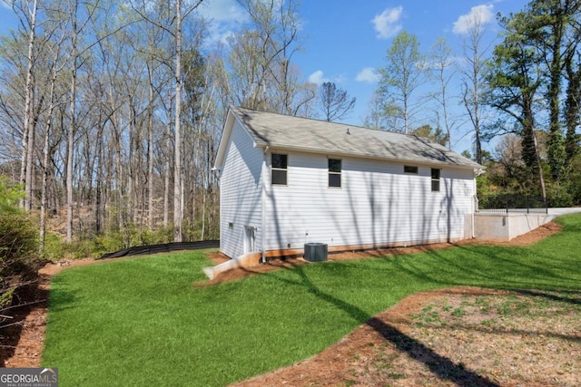 3143 Lee Cir, Buford, GA 30518 - back of house with a lawn and central AC unit