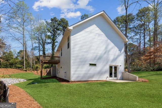 3143 Lee Cir, Buford, GA 30518 - back of house featuring a wooden deck, french doors, and a yard
