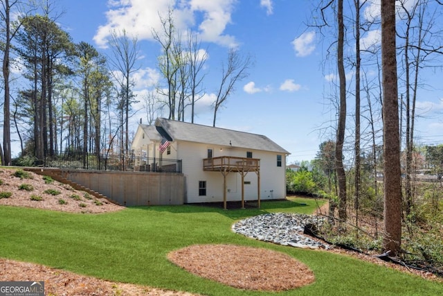3143 Lee Cir, Buford, GA 30518 - rear view of property featuring a wooden deck and a yard