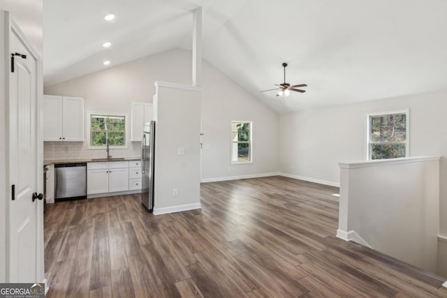3143 Lee Cir, Buford, GA 30518 - kitchen with open floor plan, stainless steel appliances, white cabinetry, and ceiling fan