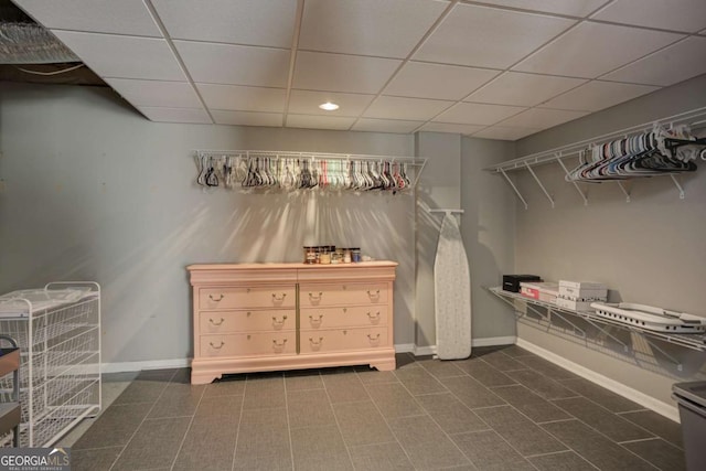 walk in closet featuring a drop ceiling