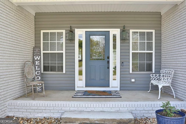 entrance to property with a porch