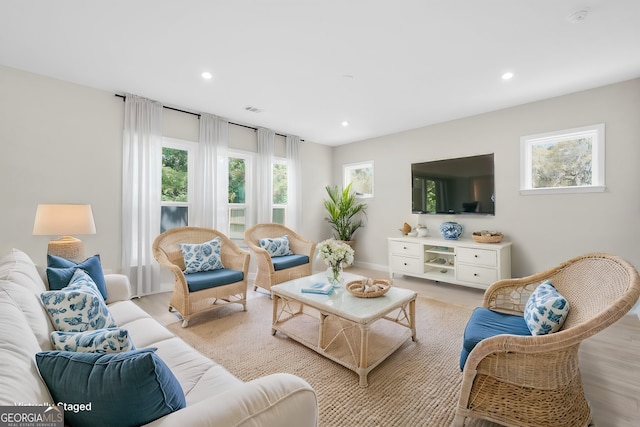 106 Canter Ct, Savannah, GA 31406 - living area with visible vents, recessed lighting, light wood-style floors, and a healthy amount of sunlight