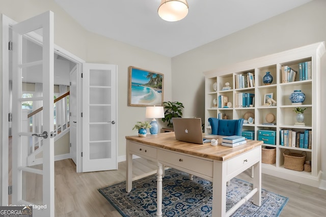 106 Canter Ct, Savannah, GA 31406 - office area with french doors, baseboards, and light wood-type flooring