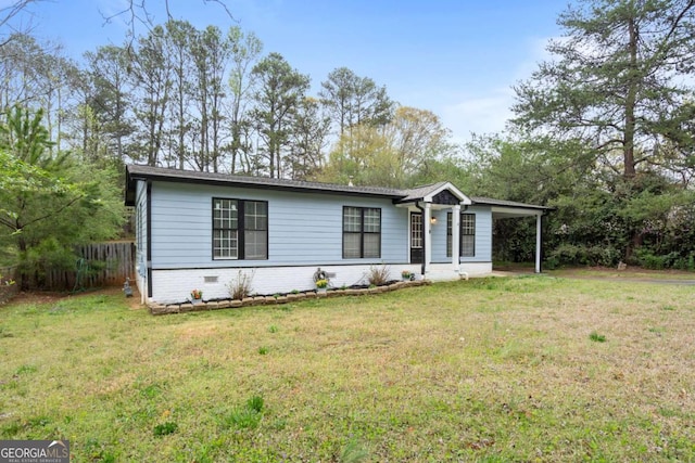 view of front of house with an attached carport, fence, crawl space, and a front yard