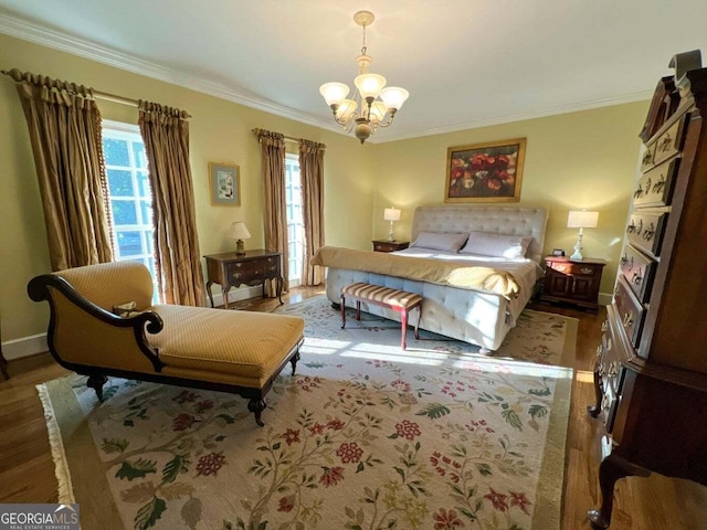 272 Sleepy Hollow Rd, Lafayette, GA 30728 - bedroom with baseboards, ornamental molding, a notable chandelier, and wood finished floors