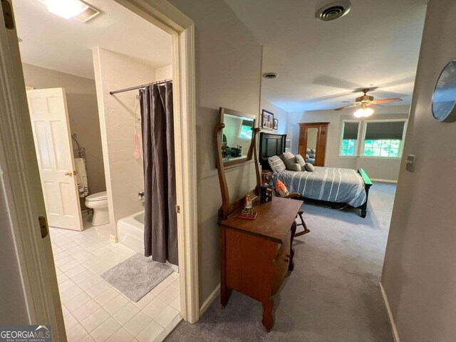 272 Sleepy Hollow Rd, Lafayette, GA 30728 - carpeted bedroom featuring tile patterned flooring, visible vents, a ceiling fan, and ensuite bath