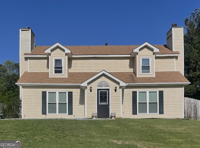 1174 Oak Knoll Ct, Lithonia, GA 30058 - view of front of home featuring fence, a chimney, a shingled roof, and a front yard