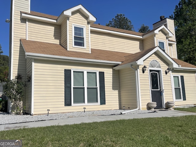 1174 Oak Knoll Ct, Lithonia, GA 30058 - view of front facade featuring roof with shingles and a chimney