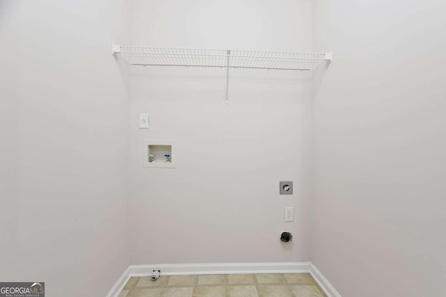 clothes washing area featuring washer hookup, baseboards, laundry area, light floors, and electric dryer hookup