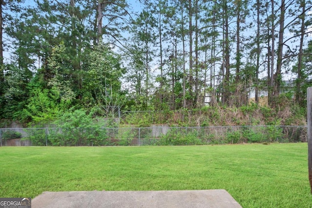 view of yard featuring fence