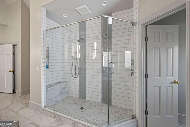 1768 Hood Rd, Dacula, GA 30019 - bathroom with marble look tiles, a shower stall, recessed lighting, and baseboards