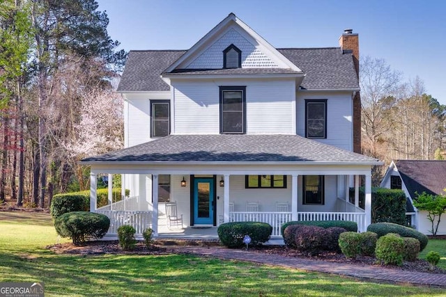1768 Hood Rd, Dacula, GA 30019 - victorian house featuring a porch, a front yard, and roof with shingles