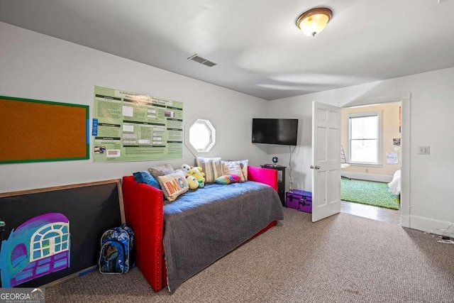 1768 Hood Rd, Dacula, GA 30019 - bedroom with carpet flooring and baseboards
