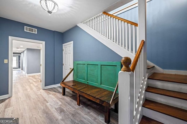 1768 Hood Rd, Dacula, GA 30019 - staircase with wood finished floors and baseboards