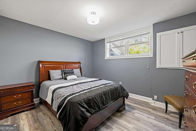 1768 Hood Rd, Dacula, GA 30019 - bedroom featuring wood finished floors and baseboards