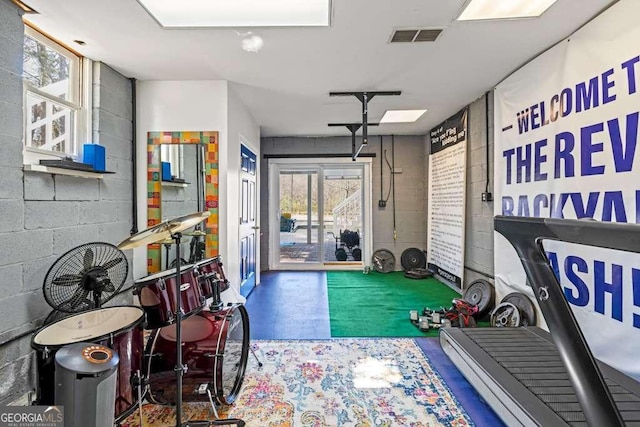 1768 Hood Rd, Dacula, GA 30019 - workout area featuring concrete block wall and plenty of natural light