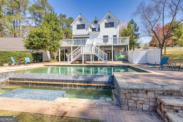 1768 Hood Rd, Dacula, GA 30019 - rear view of house featuring stairs, a patio area, and a deck