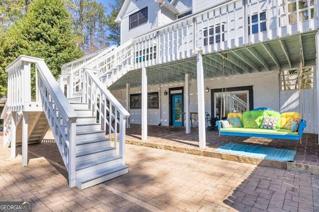 1768 Hood Rd, Dacula, GA 30019 - view of patio featuring stairs and an outdoor living space