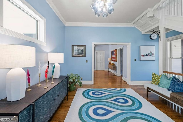 1768 Hood Rd, Dacula, GA 30019 - sitting room featuring wood finished floors, baseboards, a chandelier, and ornamental molding