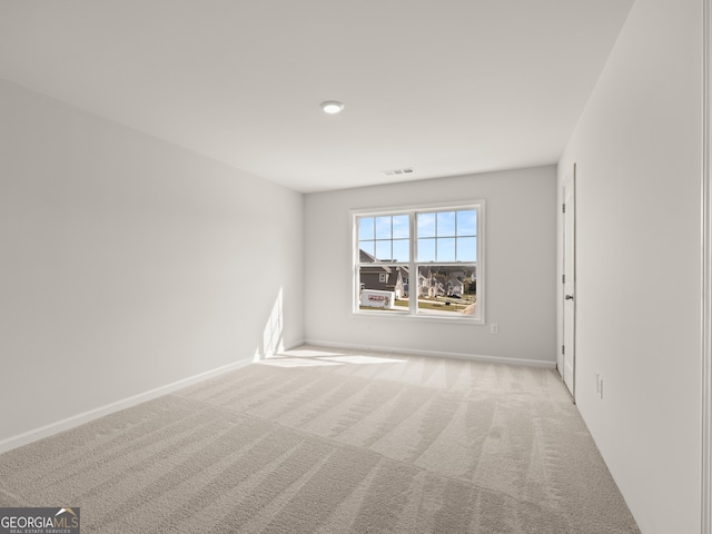 3740 Near Star Ln, Cumming, GA 30028 - carpeted spare room with baseboards and visible vents