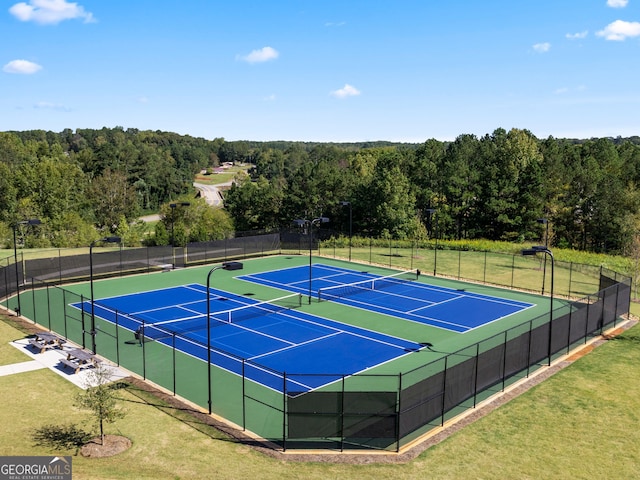 3740 Near Star Ln, Cumming, GA 30028 - view of sport court featuring a lawn, fence, a view of trees, and community basketball court