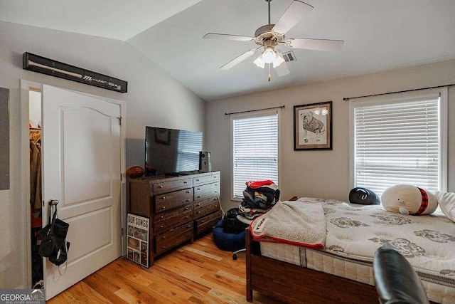 264 Center Park Ln, Athens, GA 30605 - bedroom with light wood-type flooring, multiple windows, lofted ceiling, and visible vents