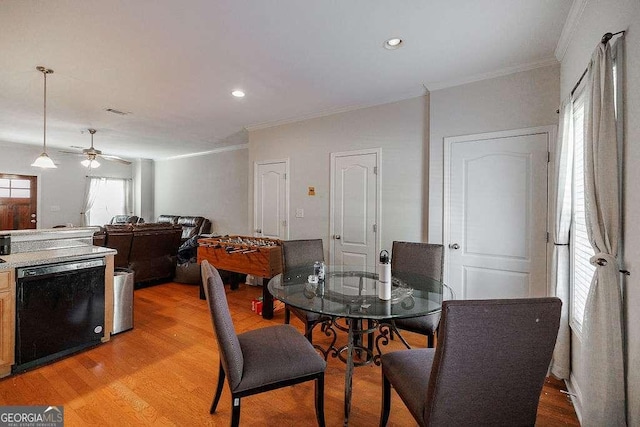 264 Center Park Ln, Athens, GA 30605 - dining space featuring light wood-type flooring, crown molding, recessed lighting, and a ceiling fan