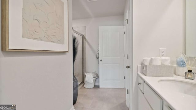 full bath featuring vanity and a shower stall