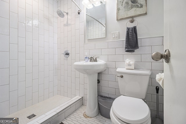 215 Piedmont Ave NE Unit 708, Atlanta, GA 30308 - full bath with a shower stall, tile walls, and tile patterned floors