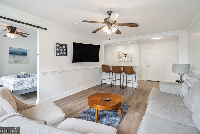 215 Piedmont Ave NE Unit 708, Atlanta, GA 30308 - living area with ceiling fan, wood finished floors, ornamental molding, and recessed lighting