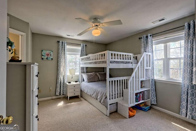 417 Hidden Forest Ln, Hayesville, NC 28904 - carpeted bedroom with multiple windows and a ceiling fan