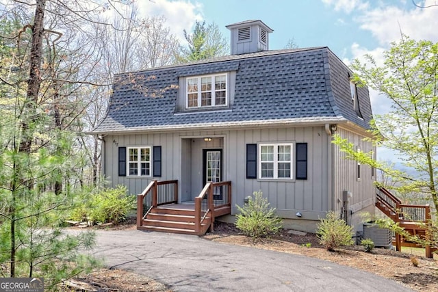 417 Hidden Forest Ln, Hayesville, NC 28904 - view of front of house with roof with shingles and board and batten siding