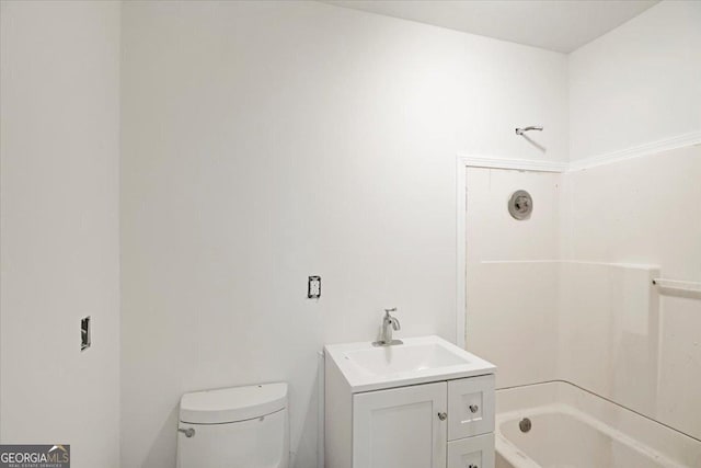 full bathroom with vanity, toilet, and shower / washtub combination