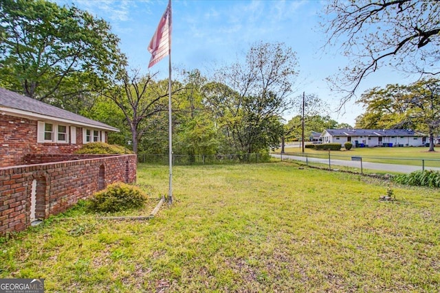 view of yard featuring fence