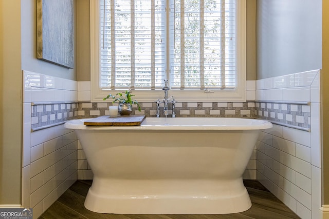 2 Palmer Dr NW, Rome, GA 30165 - full bath featuring tile walls, plenty of natural light, a freestanding tub, and wainscoting