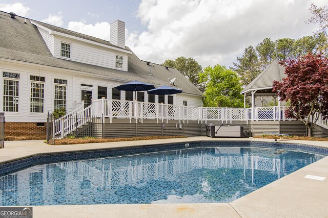 2 Palmer Dr NW, Rome, GA 30165 - swimming pool featuring a wooden deck and a hot tub