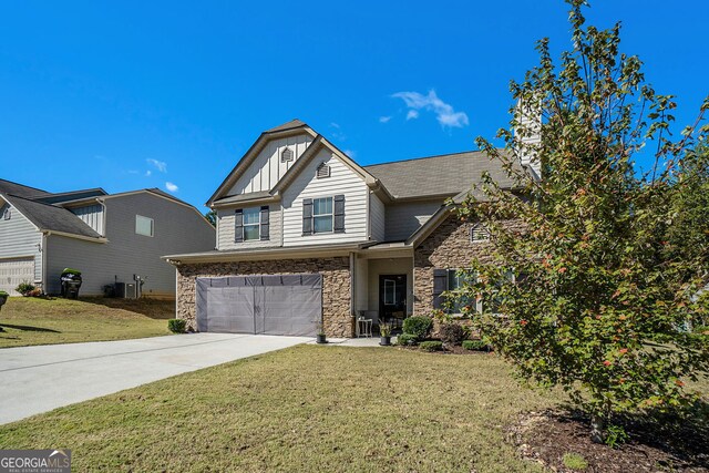 view of front of home featuring concrete driveway, an attached garage, board and batten siding, and stone siding