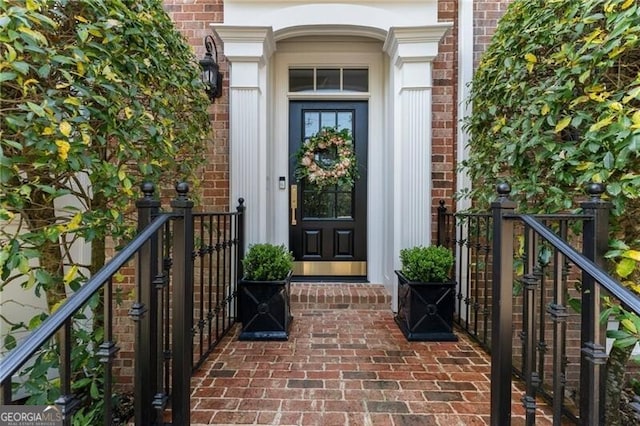 2630 Milford Ln, Alpharetta, GA 30009 - doorway to property with brick siding