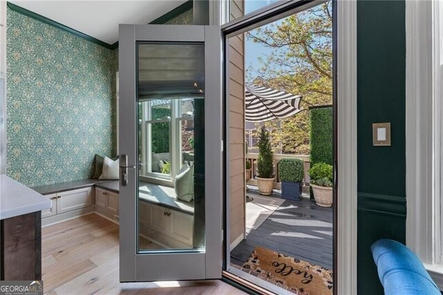 2630 Milford Ln, Alpharetta, GA 30009 - entryway with wallpapered walls, wood finished floors, and a decorative wall