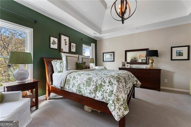 2630 Milford Ln, Alpharetta, GA 30009 - bedroom featuring light colored carpet, a tray ceiling, and a chandelier