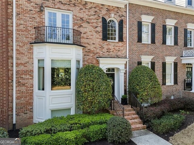 2630 Milford Ln, Alpharetta, GA 30009 - entrance to property with brick siding and a balcony