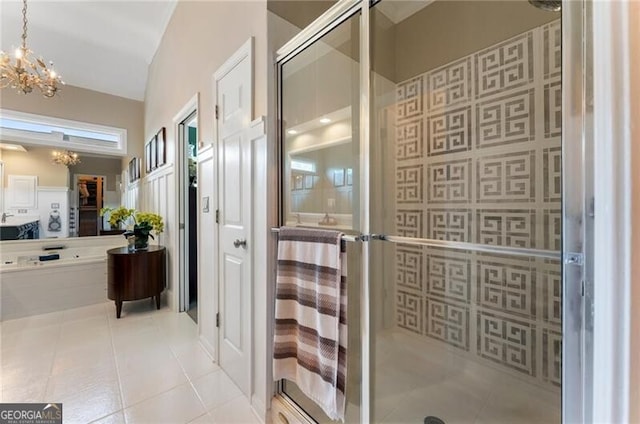 2630 Milford Ln, Alpharetta, GA 30009 - bathroom featuring a chandelier, a stall shower, and tile patterned flooring