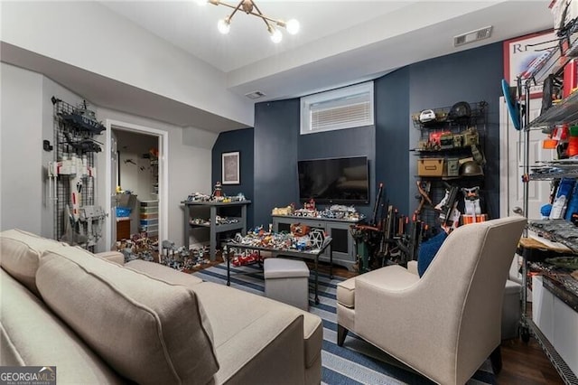 2630 Milford Ln, Alpharetta, GA 30009 - living area with a chandelier and dark wood-type flooring
